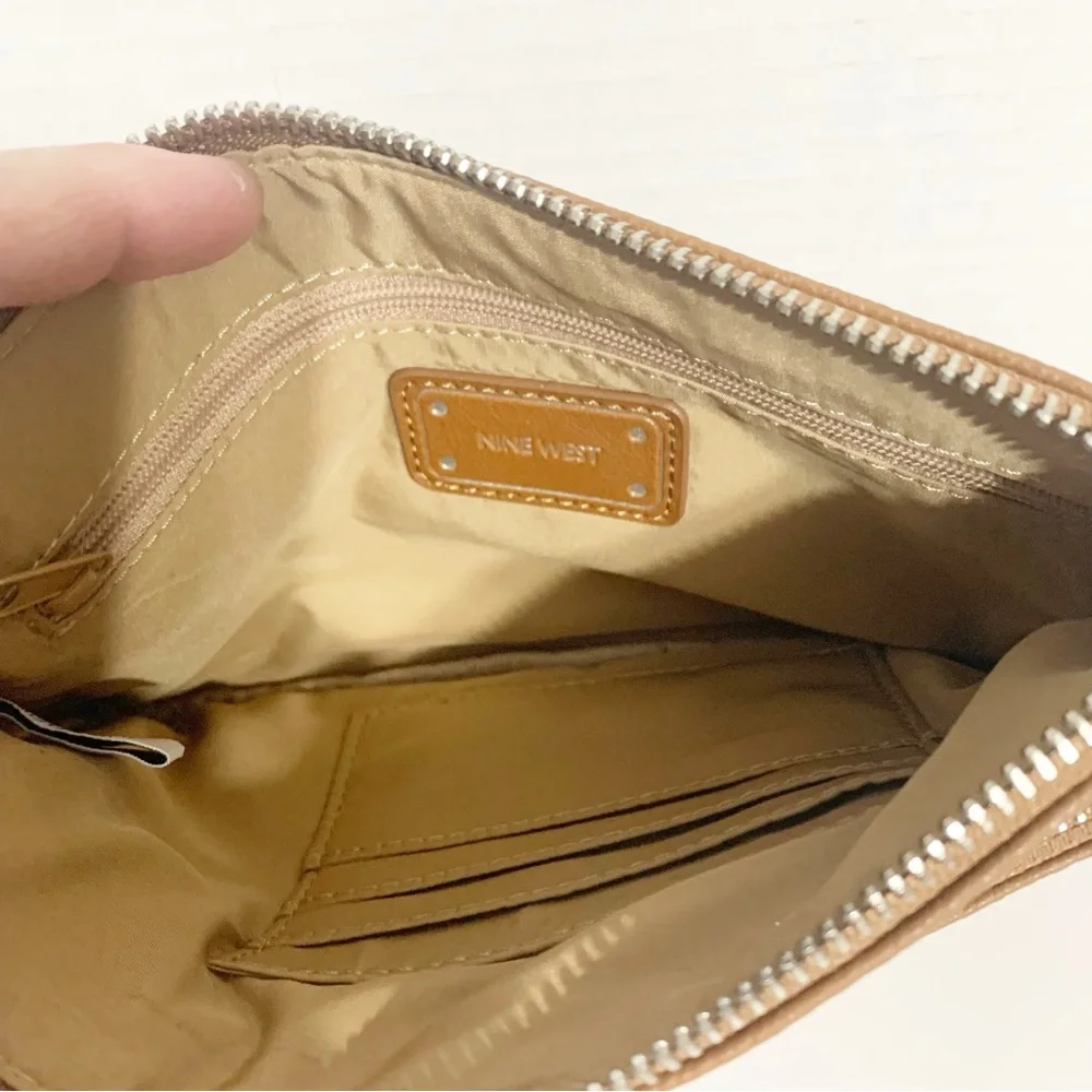 Nine West Faux Leather Wristlet Fully Line in Tan Print Studded Logo Plate Brown